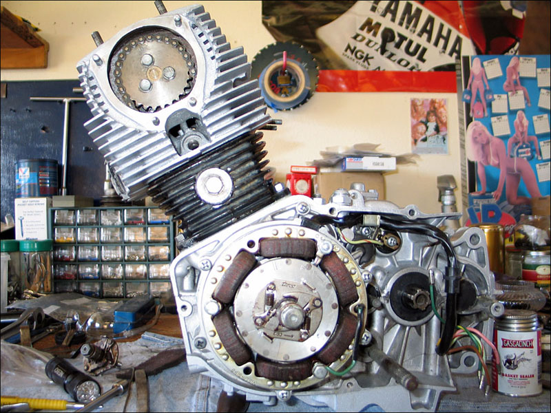 Small engine, gears, and repair parts inside the All Seasons shop